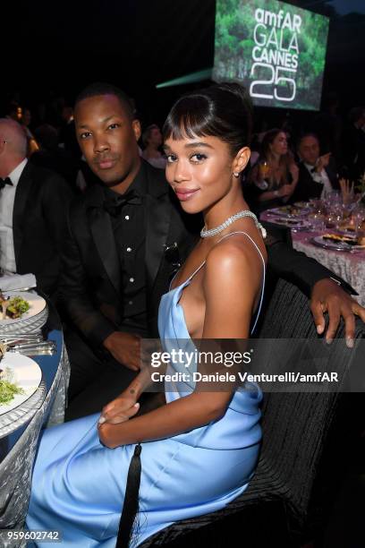 Corey Hawkins and Laura Harrier attend the amfAR Gala Cannes 2018 dinner at Hotel du Cap-Eden-Roc on May 17, 2018 in Cap d'Antibes, France.