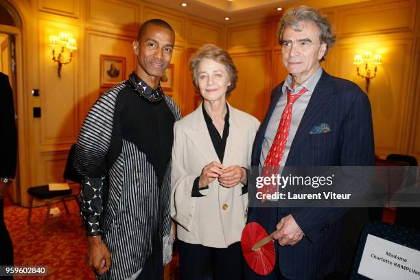 Designer Eric Raisina, Actress Charlotte Rampling and her Copanion Professor Mario Christian Meyer attend the "Eric Raisina's Fashion Show" at...