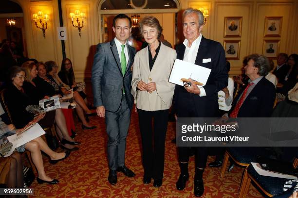 Stephane Ruffier-Meray, Charlotte Rampling and Didier Melchior attend the "Eric Raisina's Fashion Show" at Millenium Hotel Paris Opera on May 17,...