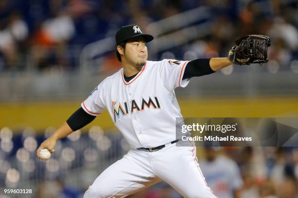 Junichi Tazawa of the Miami Marlins delivers a pitch in the fourth inning against the Los Angeles Dodgers at Marlins Park on May 17, 2018 in Miami,...