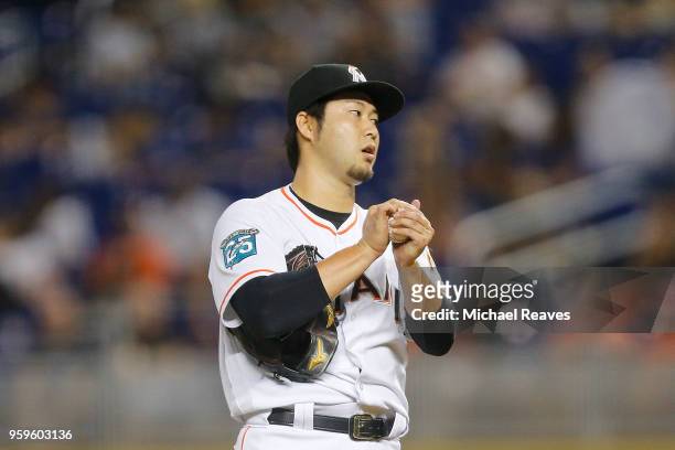 Junichi Tazawa of the Miami Marlins reacts in the fourth inning against the Los Angeles Dodgers at Marlins Park on May 17, 2018 in Miami, Florida.