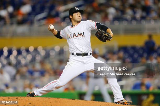 Junichi Tazawa of the Miami Marlins delivers a pitch in the fourth inning against the Los Angeles Dodgers at Marlins Park on May 17, 2018 in Miami,...