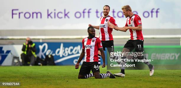 Exeter City's Hiram Boateng celebrates scoring his sides second goal with team-mates Ryan Harley, centre, and Jayden Stockley during the Sky Bet...