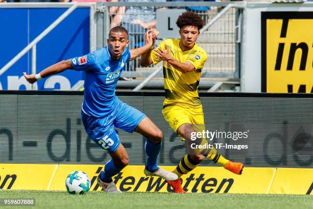 Kevin Akpoguma of Hoffenheim and Lukas Rupp of Hoffenheim battle for the ball during the Bundesliga match between TSG 1899 Hoffenheim and Borussia...