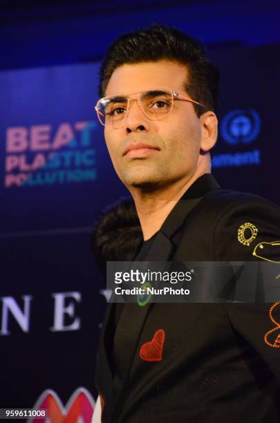 Bollywood movie director Karan Johar poses for photographers after a press conference by Wizcraft to announce the 19th Edition of IIFA Weekend &amp;...