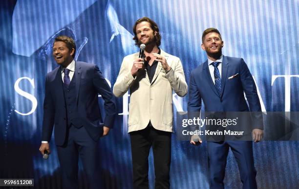 Misha Collins, Jared Padalecki and Jensen Ackles of "Supernatural" speak on stage during The CW Network's 2018 upfront at New York City Center on May...