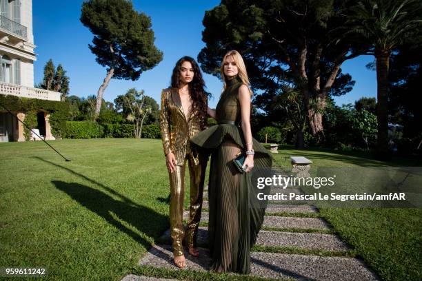 Shanina Shaik and Nadine Leopold pose for portraits at the amfAR Gala Cannes 2018 cocktail at Hotel du Cap-Eden-Roc on May 17, 2018 in Cap d'Antibes,...