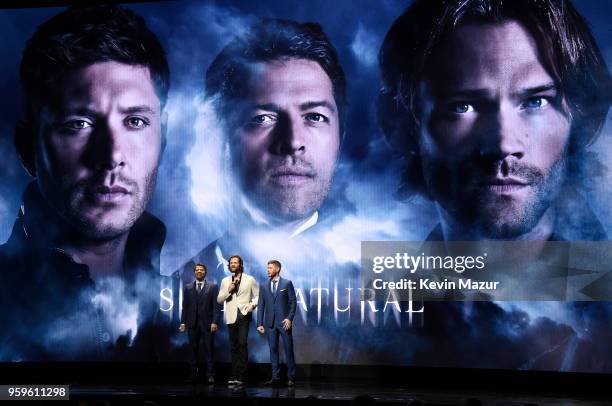 Misha Collins, Jared Padalecki and Jensen Ackles of "Supernatural" speak on stage during The CW Network's 2018 upfront at New York City Center on May...