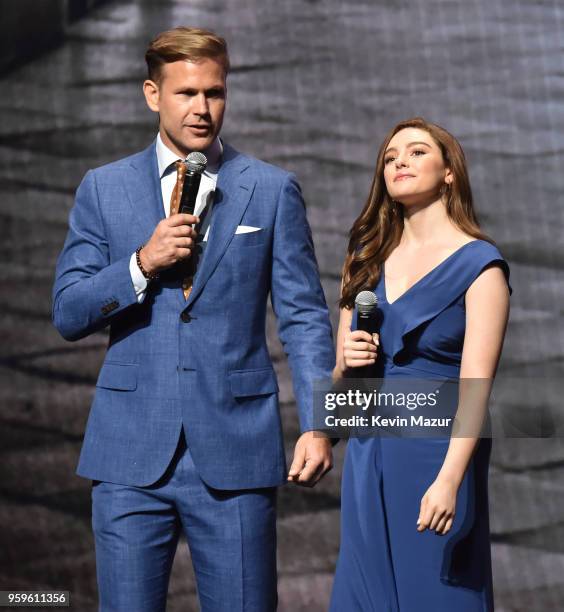 Matt Davis and Danielle Rose Russell of "Legacies" speak on stage during The CW Network's 2018 upfront at New York City Center on May 17, 2018 in New...