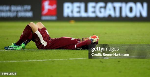 Goalkeeper Kenneth Kronholm of Holstein Kiel reacts dejected during the Bundesliga Playoff Leg 1 match between VfL Wolfsburg and Holstein Kiel at...