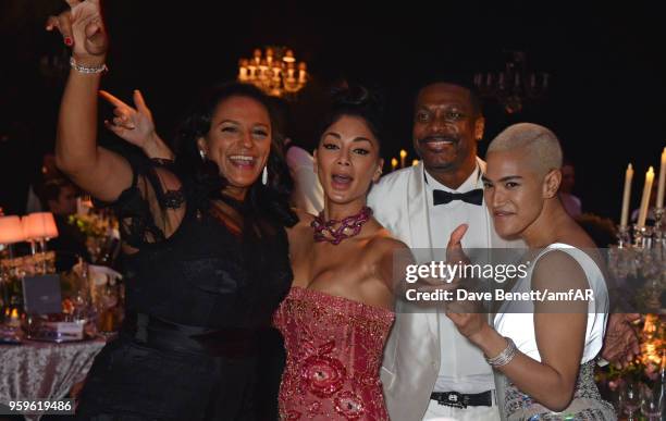 Isabel dos Santos, Nicole Scherzinger, Chris Tucker and Mette Towley attend the amfAR Gala Cannes 2018 dinner at Hotel du Cap-Eden-Roc on May 17,...