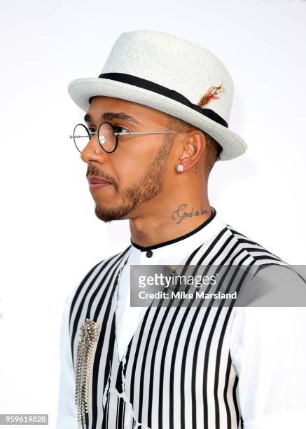 Lewis Hamilton arrives at the amfAR Gala Cannes 2018 at Hotel du Cap-Eden-Roc on May 17, 2018 in Cap d'Antibes, France.