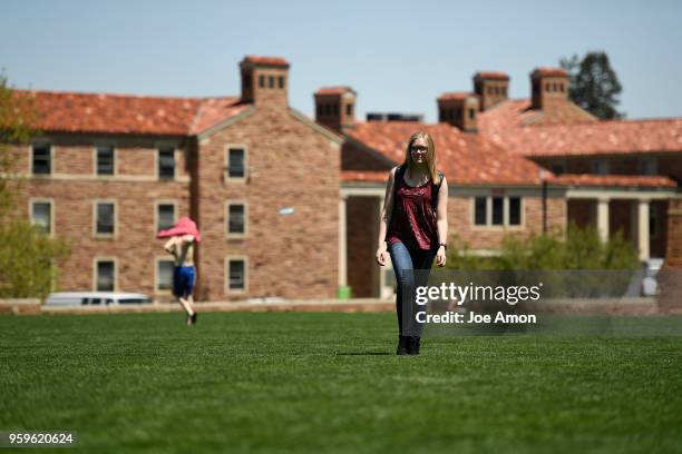 Emily Murray 19, walking across Farrand Field to study as she finishes her first semester as a Junior at University of Colorado Boulder . May 08,...