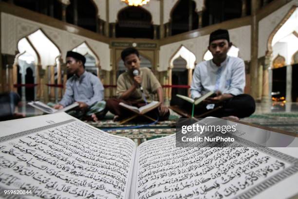 The Acehnese were reading the Qur'an at night during the month of Ramadan at the Syuhada Mosque in Lhokseumawe, Aceh, Indonesia, on May 18, 2018....