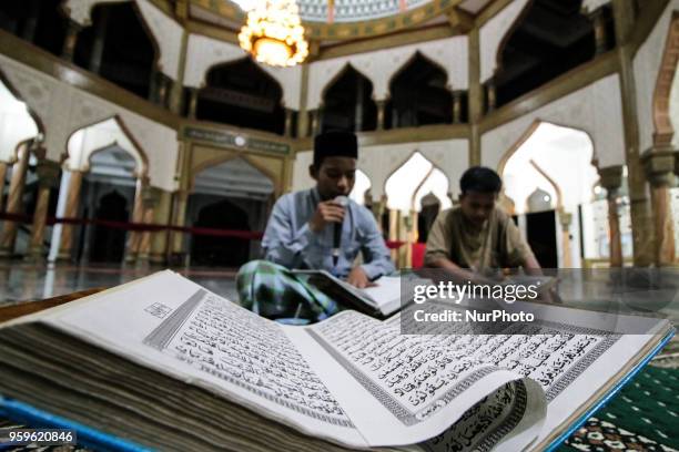 The Acehnese were reading the Qur'an at night during the month of Ramadan at the Syuhada Mosque in Lhokseumawe, Aceh, Indonesia, on May 18, 2018....