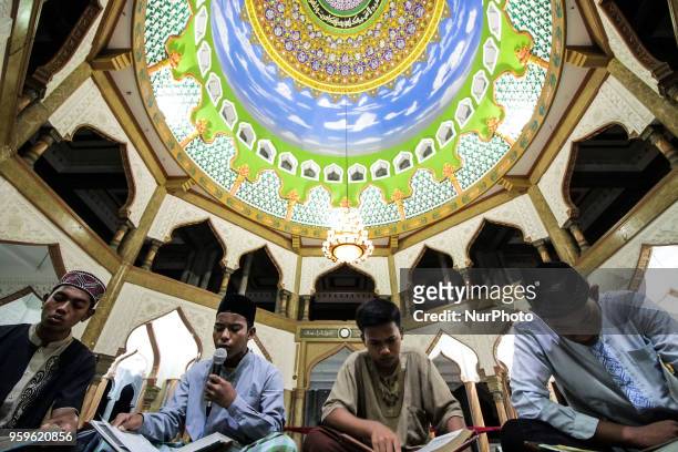 The Acehnese were reading the Qur'an at night during the month of Ramadan at the Syuhada Mosque in Lhokseumawe, Aceh, Indonesia, on May 18, 2018....