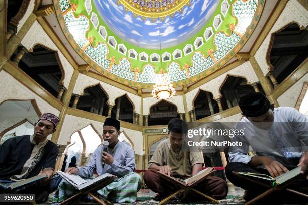 The Acehnese were reading the Qur'an at night during the month of Ramadan at the Syuhada Mosque in Lhokseumawe, Aceh, Indonesia, on May 18, 2018....