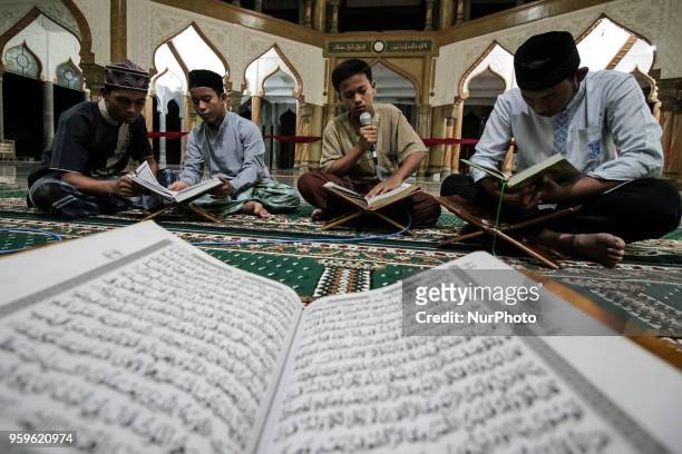 The Acehnese were reading the Qur'an at night during the month of Ramadan at the Syuhada Mosque in Lhokseumawe, Aceh, Indonesia, on May 18, 2018....