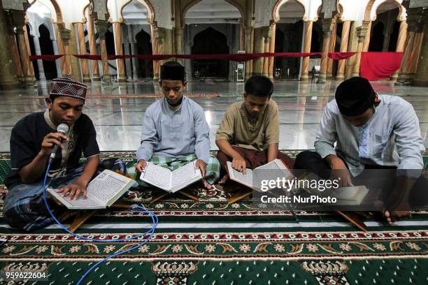 The Acehnese were reading the Qur'an at night during the month of Ramadan at the Syuhada Mosque in Lhokseumawe, Aceh, Indonesia, on May 18, 2018....