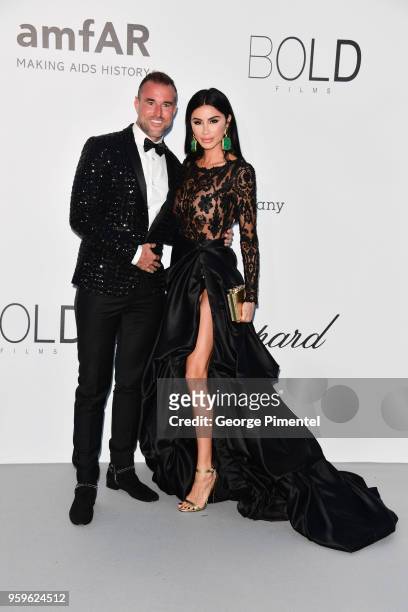 Philipp Plein and Morgan Osman arrives at the amfAR Gala Cannes 2018 at Hotel du Cap-Eden-Roc on May 17, 2018 in Cap d'Antibes, France.