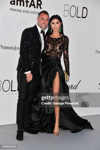 Philipp Plein and Morgan Osman arrives at the amfAR Gala Cannes 2018 at Hotel du Cap-Eden-Roc on May 17, 2018 in Cap d'Antibes, France.