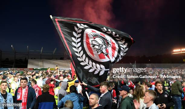 Exeter City fans celebrate after the final whistle during the Sky Bet League Two Playoff match at St James Park, Exeter.