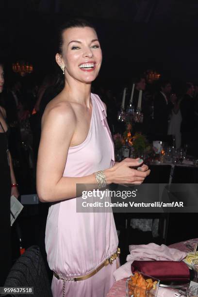 Milla Jovovich attends the amfAR Gala Cannes 2018 dinner at Hotel du Cap-Eden-Roc on May 17, 2018 in Cap d'Antibes, France.