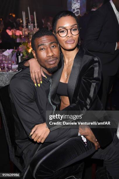 Iman Shumpert and Teyana Taylor attend the amfAR Gala Cannes 2018 dinner at Hotel du Cap-Eden-Roc on May 17, 2018 in Cap d'Antibes, France.