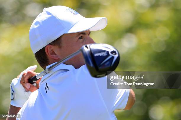 Jordan Spieth plays his tee shot on the ninth hole during the first round of the AT&T Byron Nelson at Trinity Forest Golf Club on May 17, 2018 in...