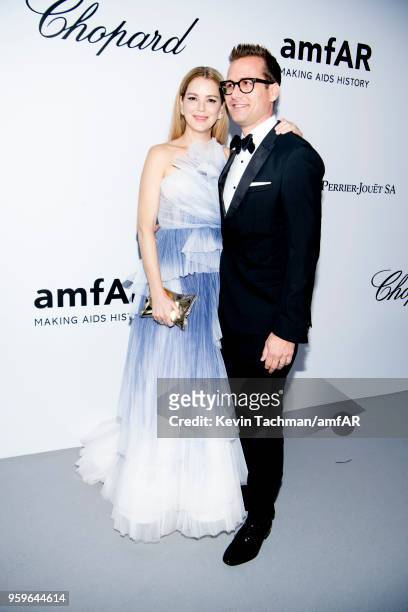 Jacinda Barrett and Gabriel Macht arrive at the amfAR Gala Cannes 2018 at Hotel du Cap-Eden-Roc on May 17, 2018 in Cap d'Antibes, France.