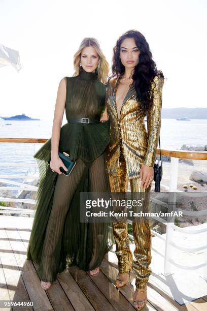 Nadine Leopold and Shanina Shaik attend the cocktail at the amfAR Gala Cannes 2018 at Hotel du Cap-Eden-Roc on May 17, 2018 in Cap d'Antibes, France.