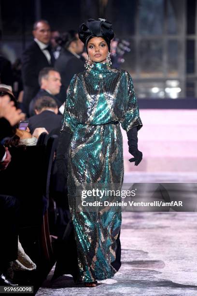 Halima Aden wearing Marc Jacobs walks the runway at the amfAR Gala Cannes 2018 at Hotel du Cap-Eden-Roc on May 17, 2018 in Cap d'Antibes, France.