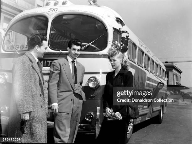 Portrait of Chico Alvarez and June Christy with Stan Kenton Tour Bus, 1947 or 1948.