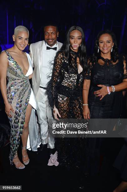 Mette Towley, Chris Tucker, Winnie Harlow and Isabel dos Santos attend the amfAR Gala Cannes 2018 dinner at Hotel du Cap-Eden-Roc on May 17, 2018 in...