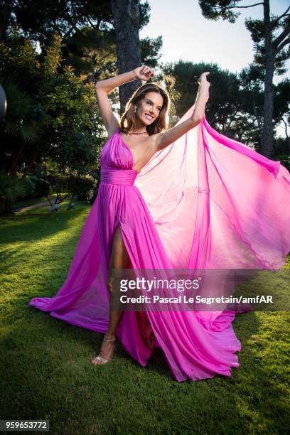 Alessandra Ambrosio poses for portraits at the amfAR Gala Cannes 2018 cocktail at Hotel du Cap-Eden-Roc on May 17, 2018 in Cap d'Antibes, France.