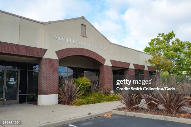 Facade with logo at headquarters of S and C Electric Company, a server room technology company on the Alameda, California, May 14, 2018.