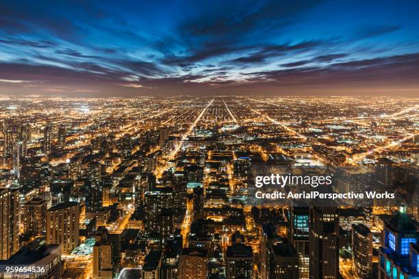 chicago skyline at night - illinois aerial stock pictures, royalty-free photos & images