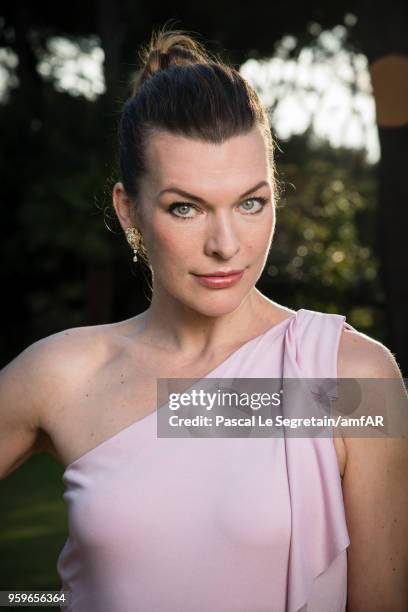 Milla Jovovich poses for portraits at the amfAR Gala Cannes 2018 cocktail at Hotel du Cap-Eden-Roc on May 17, 2018 in Cap d'Antibes, France.