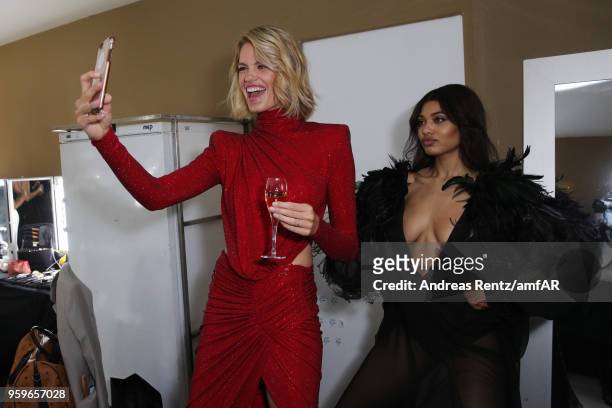 Hailey Clauson and Danielle Herrington are seen backstage at the amfAR Gala Cannes 2018 at Hotel du Cap-Eden-Roc on May 17, 2018 in Cap d'Antibes,...