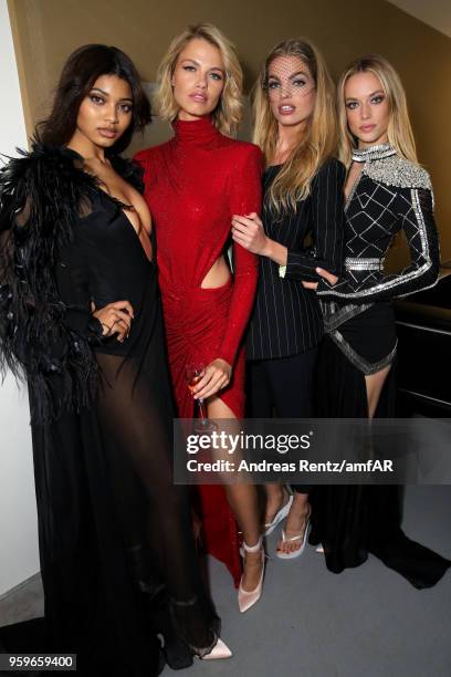 Danielle Herrington, Hailey Clauson, Daphne Groeneveld and Hannah Ferguson backstage at the amfAR Gala Cannes 2018 at Hotel du Cap-Eden-Roc on May...