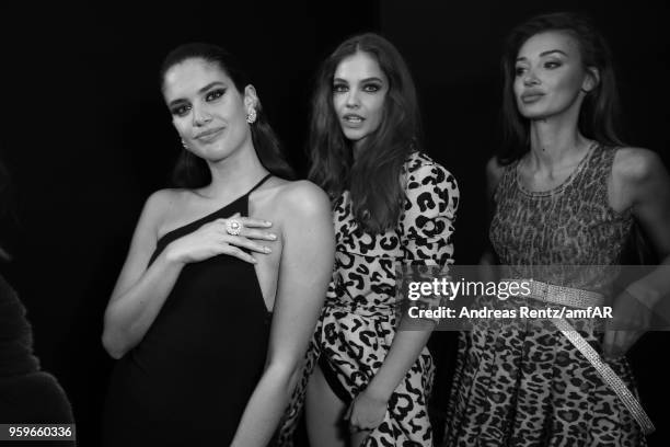 Sara Sampaio, Barbara Palvin and Lara Leito pose backstage at the amfAR Gala Cannes 2018 at Hotel du Cap-Eden-Roc on May 17, 2018 in Cap d'Antibes,...