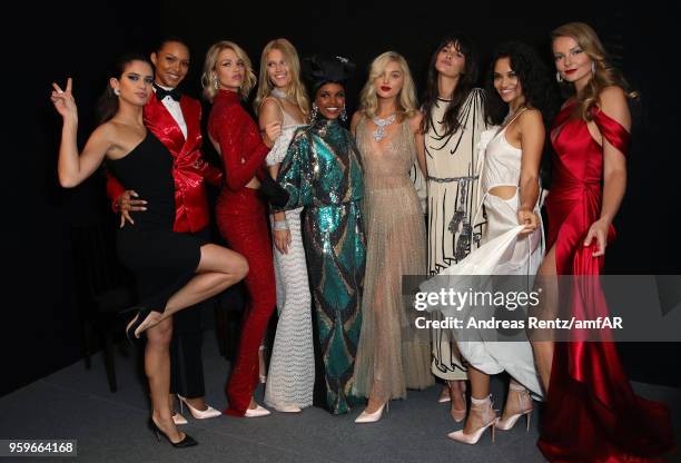 Models Sara Sampaio, Lais Ribeiro, Hailey Clauson, Toni Garrn, Halima Aden, Elsa Hosk, Vanessa Moody, Shanina Shaik and Eniko Mihalik pose backstage...