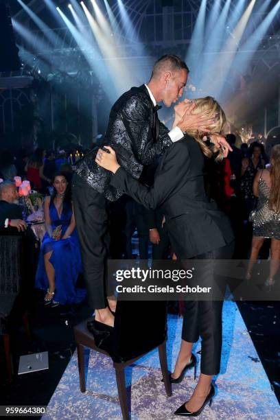 Dan Caten and Hailey Clauson attend the amfAR Gala Cannes 2018 dinner at Hotel du Cap-Eden-Roc on May 17, 2018 in Cap d'Antibes, France.