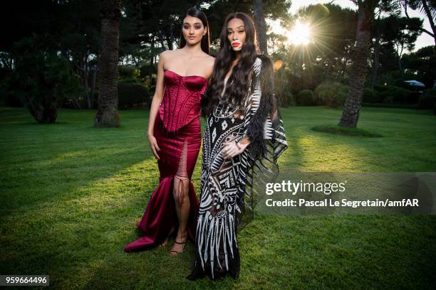 Neelam Gill and Winnie Harlow poses for portraits at the amfAR Gala Cannes 2018 cocktail at Hotel du Cap-Eden-Roc on May 17, 2018 in Cap d'Antibes,...