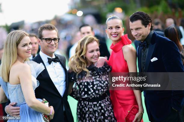 Jacinda Barrett, Gabriel Macht, Caroline Scheufele, Petra Nemcova and guest attend the cocktail at the amfAR Gala Cannes 2018 at Hotel du...