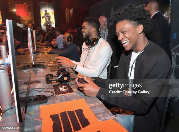 Basketball players De'Aaron Fox and Karl-Anthony Towns battle it out at the Call of Duty: Black Ops 4 Community Reveal Event in Hawthorne, CA, on May...