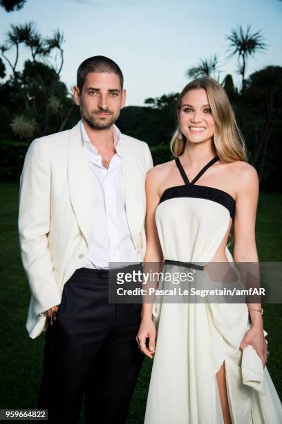 Carl Hirschmann and Fiammetta Cicogna pose for portraits at the amfAR Gala Cannes 2018 cocktail at Hotel du Cap-Eden-Roc on May 17, 2018 in Cap...
