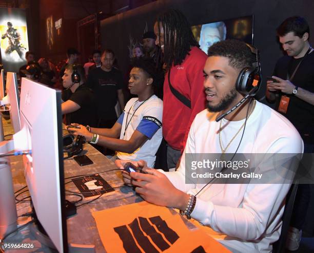 Basketball player De'Aaron Fox, football player Todd Gurley II and basketball player Karl-Anthony Towns battle it out at the Call of Duty: Black Ops...