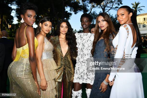Maria Borges, Danielle Herrington, Shanina Shaik, Fatou Jobe, guest and Lais Ribeiro attend the cocktail at the amfAR Gala Cannes 2018 at Hotel du...