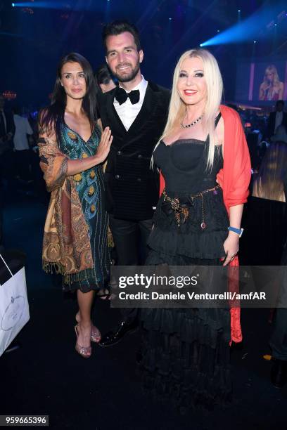 Andrea Iervolini and Monika Bacardi attend the amfAR Gala Cannes 2018 dinner at Hotel du Cap-Eden-Roc on May 17, 2018 in Cap d'Antibes, France.